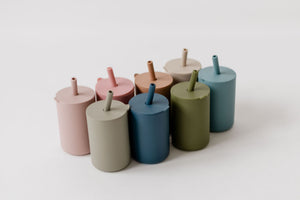 Colorful toddler cups with straws, perfect for little hands and easy sipping. Ideal for kids' drinkware collection.