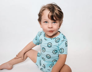 Ombre Smiles short set for babies, featuring soft bedding in a stylish design, angle view showcasing comfort and style.