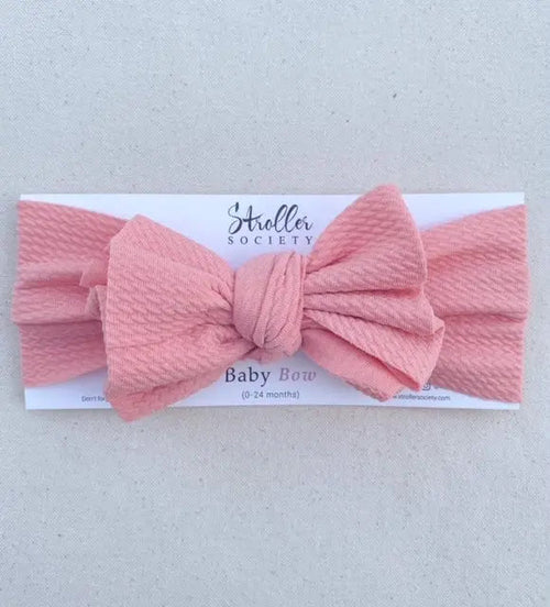 Cute baby bows hair accessories in various colors, perfect for stylish little ones.
