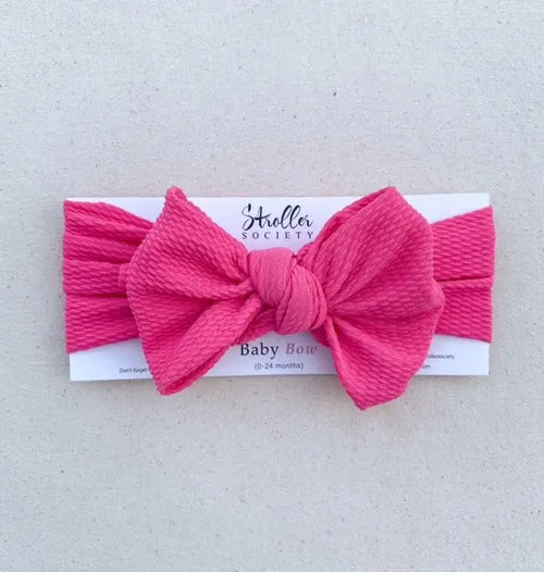 Adorable baby bows in various colors, perfect hair accessories for little ones. Angle 11 view showcases their charm.