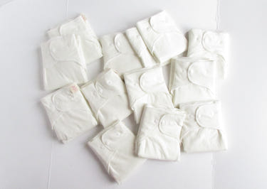 Extended Wing Butterfly Winged Perfect Fit Preflat in vibrant colors, perfect for comfortable baby diapering.