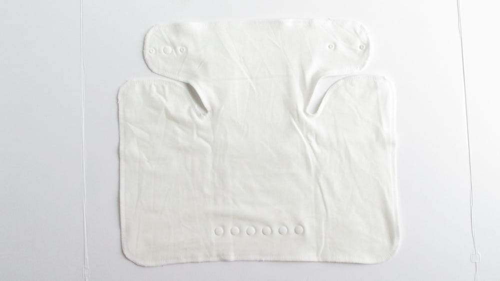 Extended Wing Butterfly Winged Perfect Fit Preflat in vibrant colors, perfect for comfortable baby diapering.