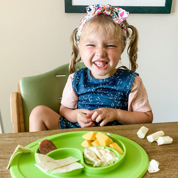Willow Bapron for babies, stylish and functional bib-apron hybrid, shown at angle 9. Perfect for mealtime messes.