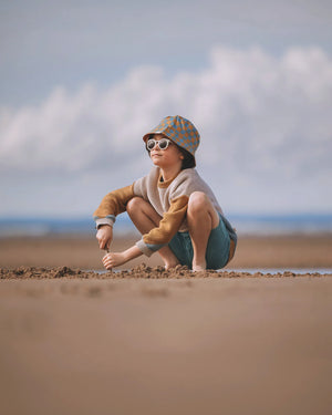 Classic sustainable sunglasses for kids aged 3-8, plant-based, bendable, polarized, shown at angle 10.