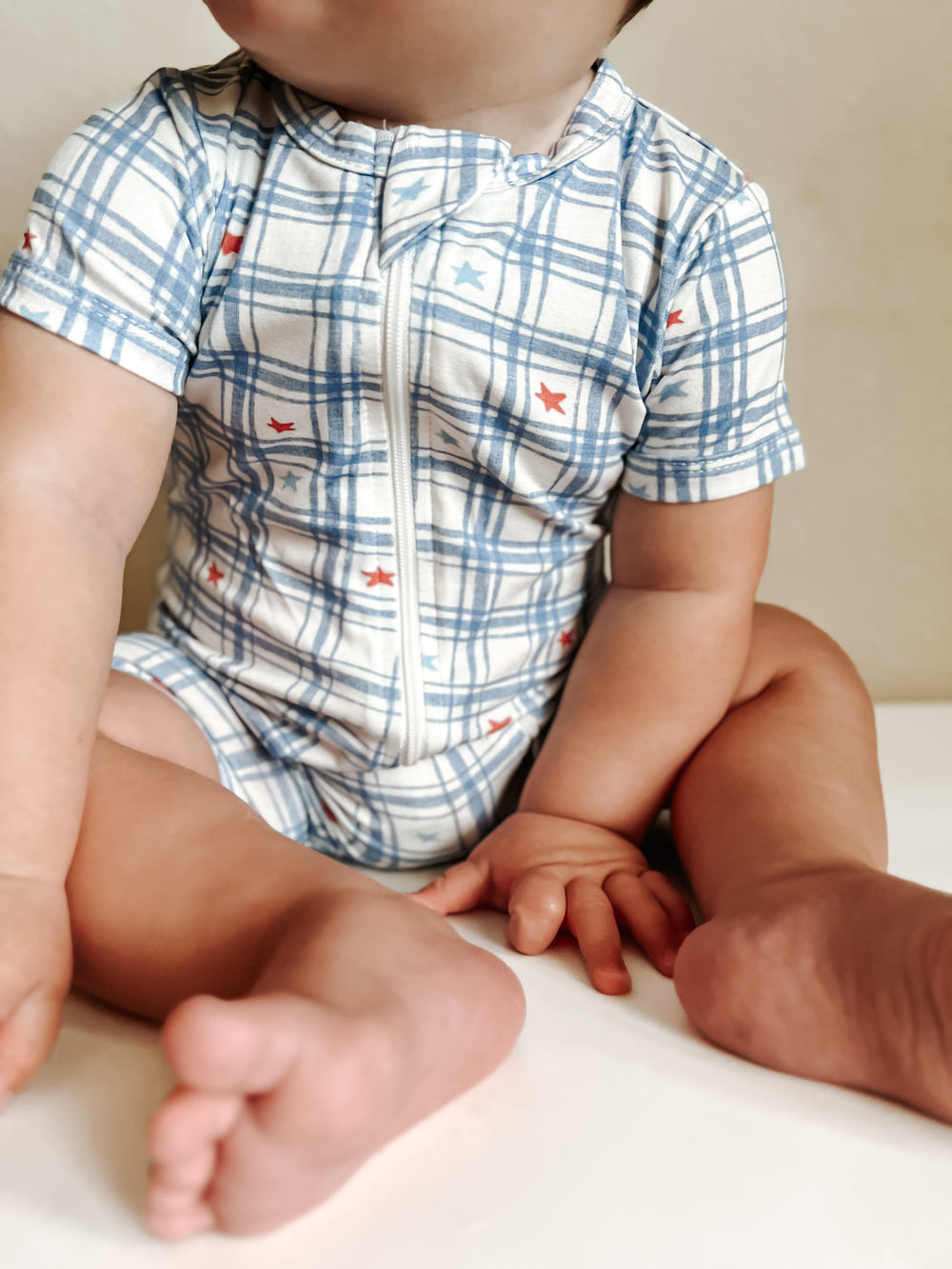 Stars Gingham Bamboo Shorty Romper for babies - stylish and comfortable clothing for little ones.