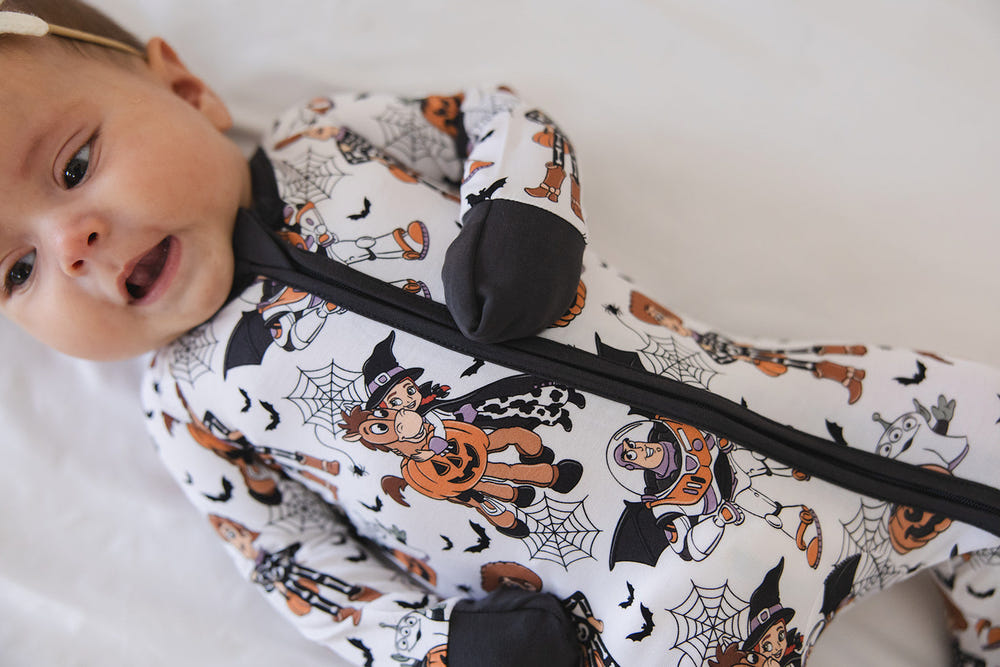 Howdy Boo Zippy zip pajamas for babies, soft and cozy footies in vibrant colors, perfect for comfort and style.