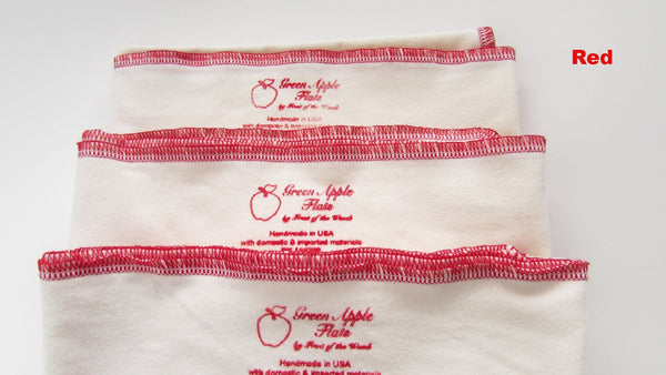 Stretchy flat cloth diapers in various colors, showcasing their softness and versatility for eco-friendly baby care.