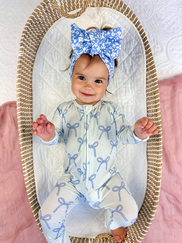 Blue Belle Ribbed Bamboo Zippy Pajamas for babies in soft blue, perfect for cozy sleep and play.