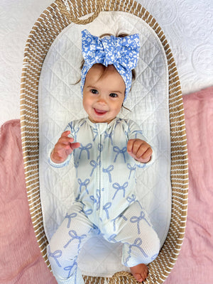 Blue Belle Ribbed Bamboo Zippy Pajamas for babies, soft and cozy, shown from angle 5. Perfect for sleep and play.