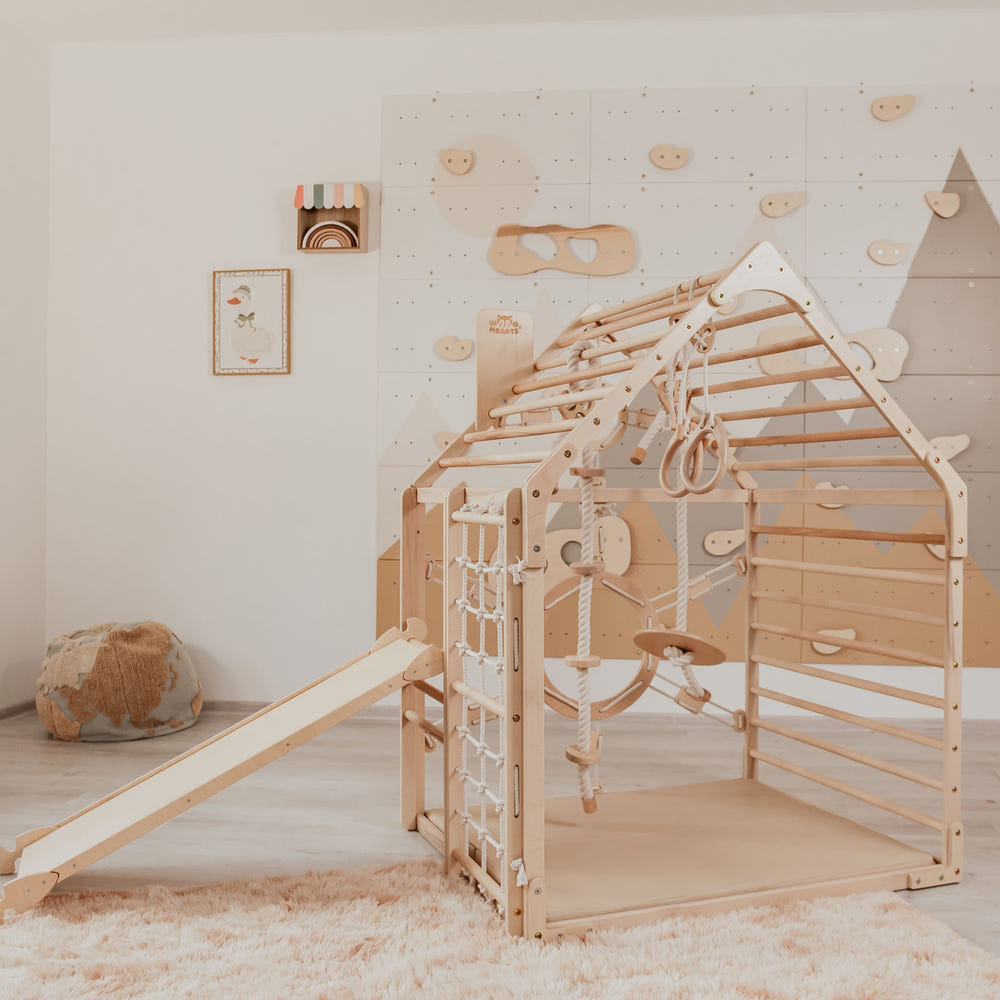 Wood and Hearts Wooden Toddler Climbing Playhouse for ages 1-6, perfect for outdoor play and exploration.