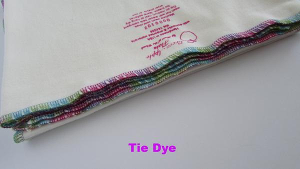 "Stretchy flat cloth diapers in various colors, angled view showcasing softness and flexibility for comfortable baby care."