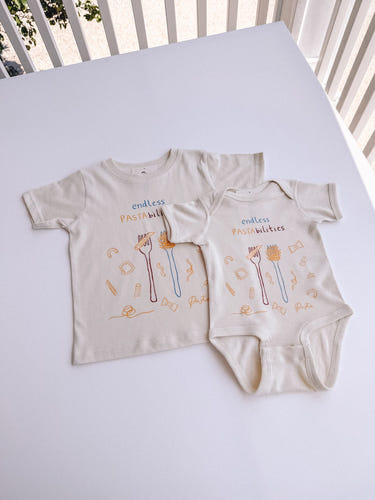 Endless Pastabilities short sleeve onesie for babies, featuring a playful pasta-themed design.