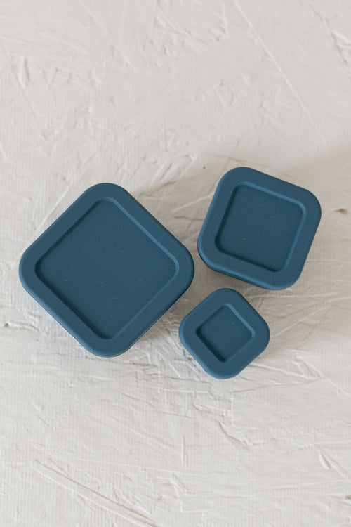 Silicone Bento Box Set of 3 for baby food storage and on-the-go meals, angled view showcasing vibrant colors.