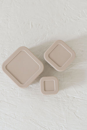 Silicone Bento Box Set of 3 for baby food storage and on-the-go meals, angled view showcasing vibrant colors.