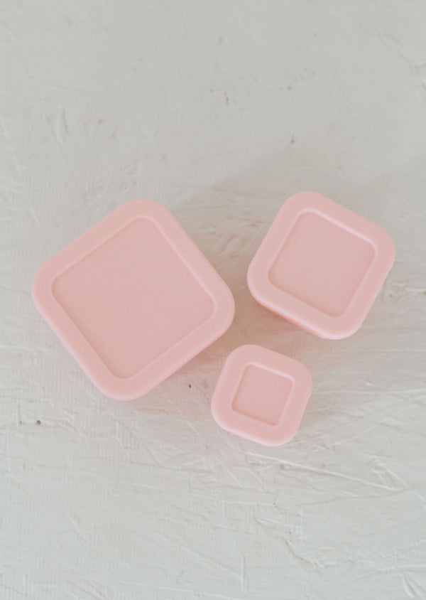 Silicone Bento box set of 3 for baby food storage and on-the-go meals, angled view showcasing vibrant colors.