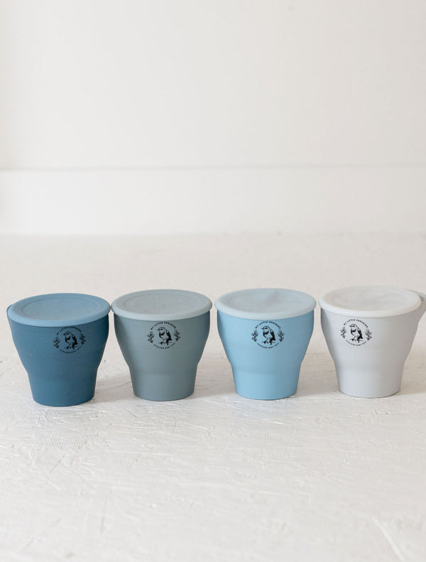 Silicone snack cups in angle 19, perfect for toddlers and easy to collapse for storage.