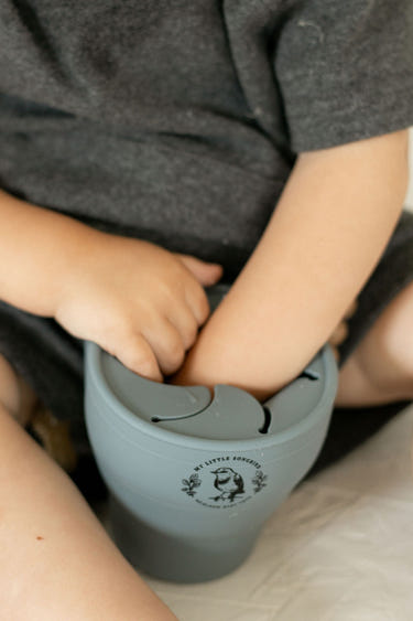 Silicone collapsible snack cups for babies, perfect for on-the-go snacks and easy storage.