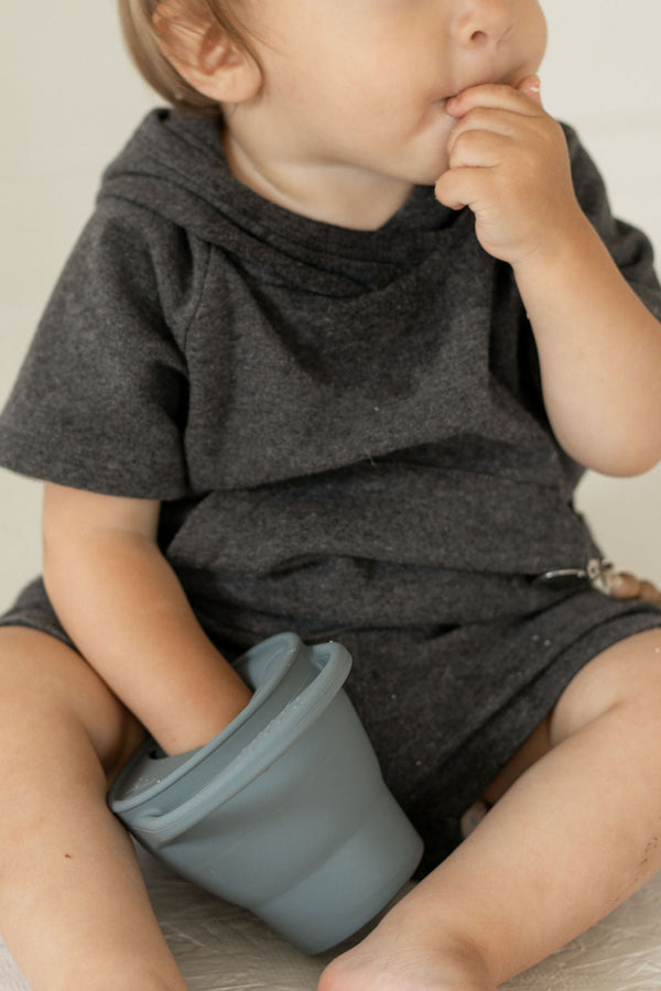 Collapsible silicone snack cups for babies, perfect for on-the-go snacks and easy storage.