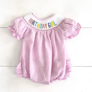 Smocked Birthday Girl Bubble for toddlers, perfect for celebrating special occasions in style.