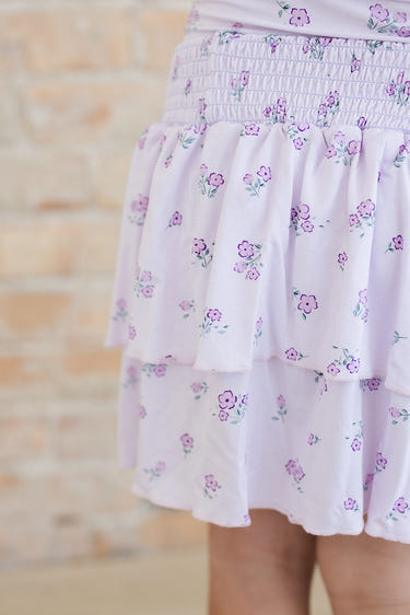 Aisley tiered smocked skirt for babies, featuring a stylish design and comfortable fit. Perfect for any occasion.