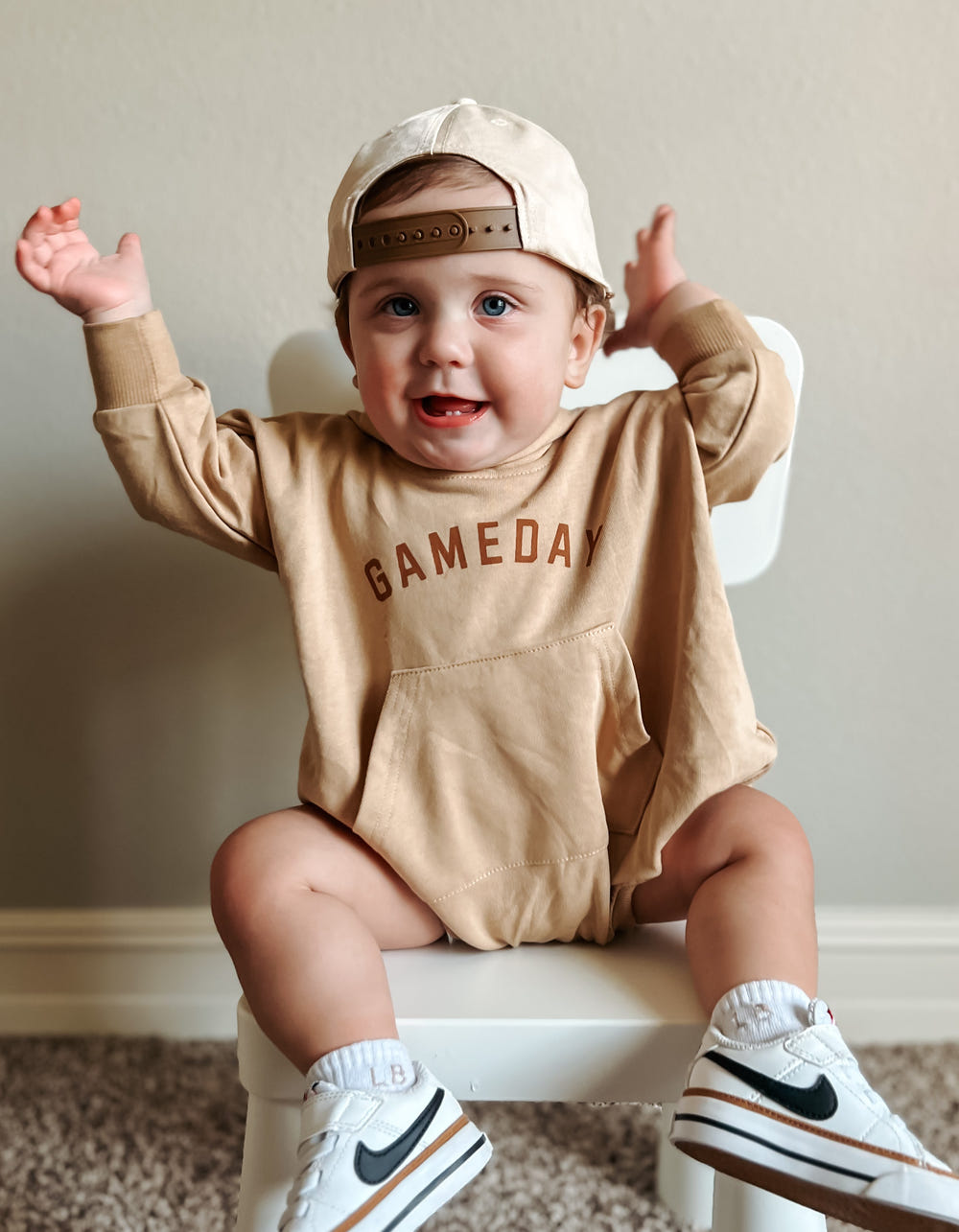 Gameday Hooded Sweatshirt Romper for babies, perfect for cozy and stylish outings.