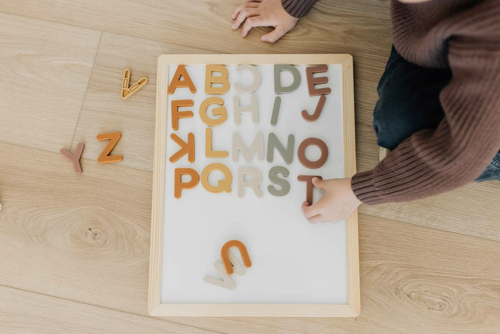 Alphabet Magnet Play Set and Whiteboard Bundle for creative learning and fun activities for babies and toddlers.