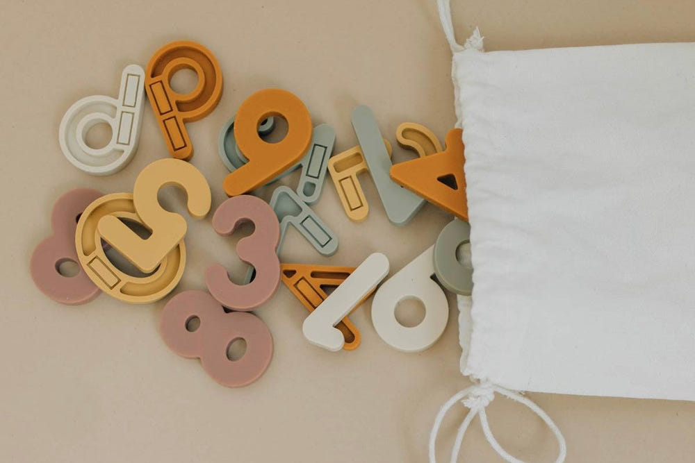 Colorful silicone magnetic numbers playset for early learning and sensory play, featuring 20 pieces.