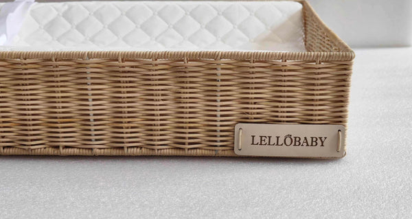 LELLobaby™ X Hampton BABY Rattan Wicker Changing Tray Premier at an angle, perfect for stylish baby care.
