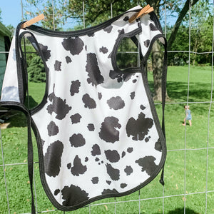 Cowhide Bapron on sale, stylish and functional baby apron, perfect for mealtime messes. Angle 8 view.