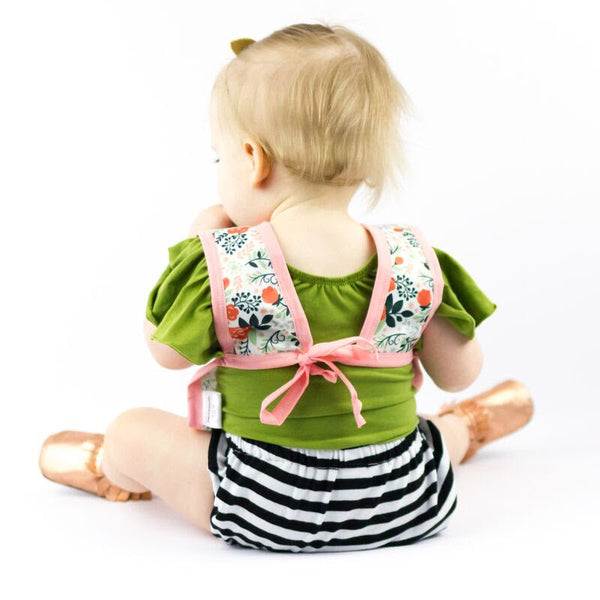 Vintage Rose Bapron for babies, stylish and functional, shown at an angle for a detailed view.