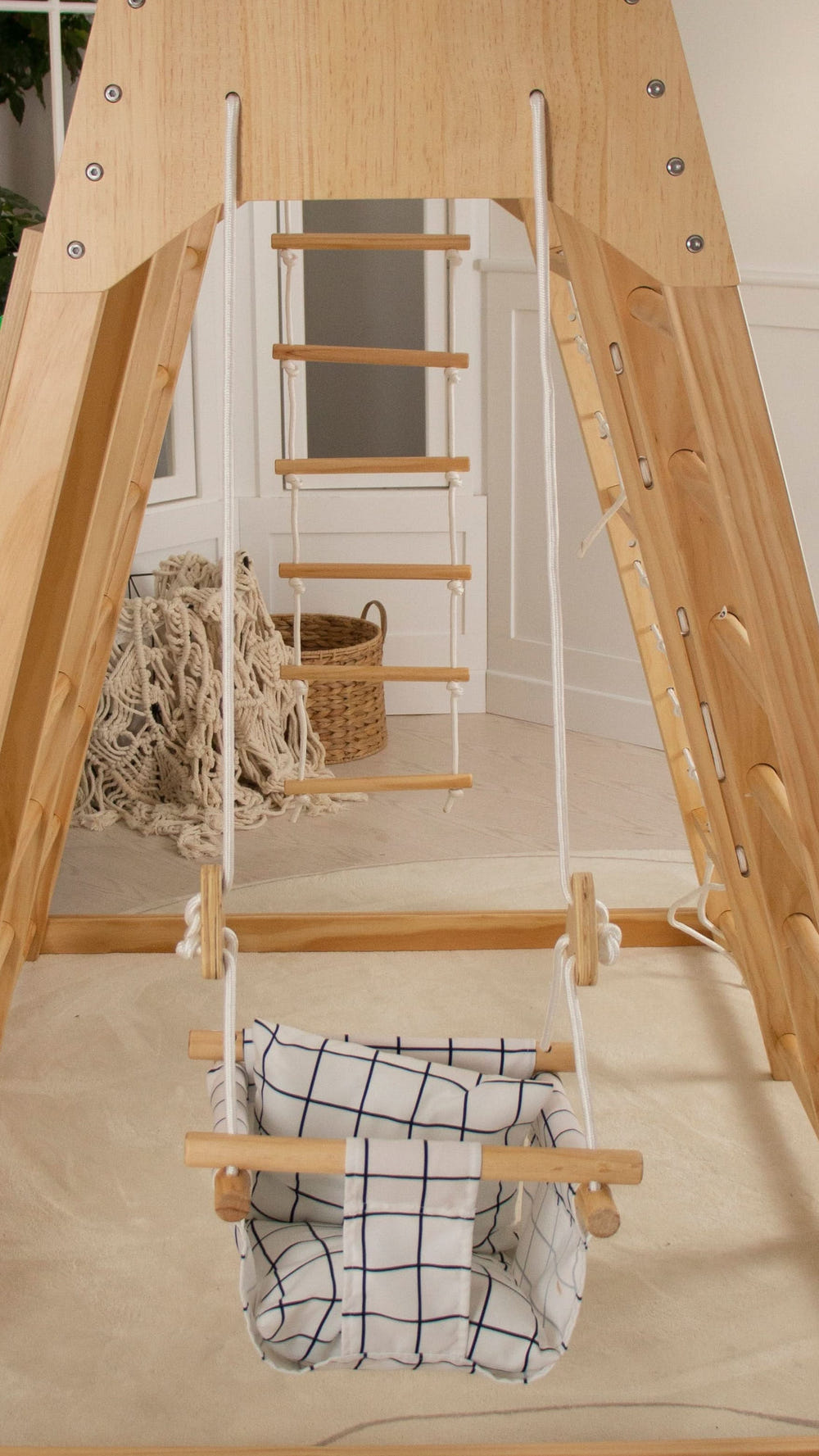 Baby swing for indoor playsets, perfect for keeping your little one entertained and safe while playing indoors.