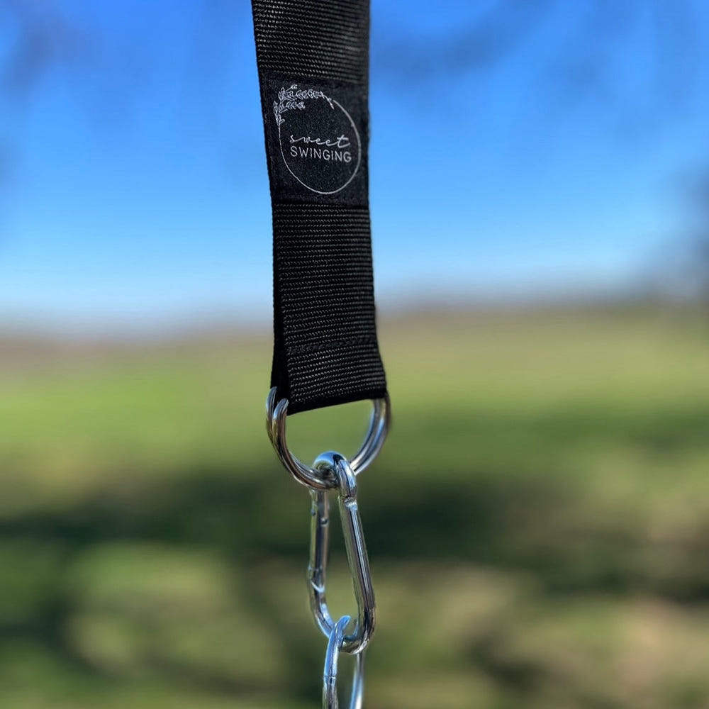 "Tree Straps Set for secure and versatile baby gear attachment outdoors."