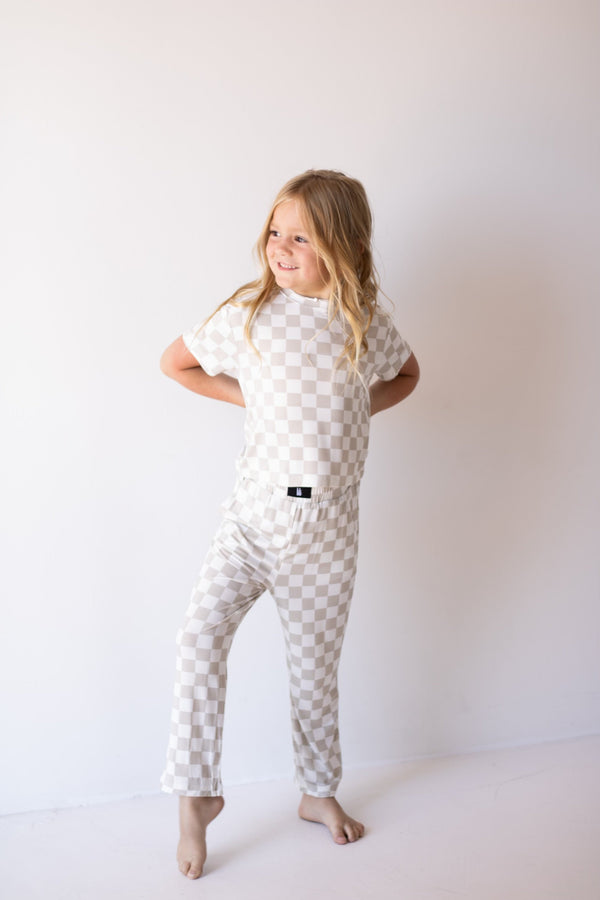 Child Boxy Tee Lounge Set in checkerboard pattern for babies, perfect for cozy pajama wear. Angle 2 view.