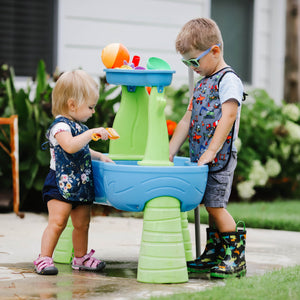 "Construction Zone Bapron for babies, featuring colorful construction vehicles, perfect for messy mealtime fun."