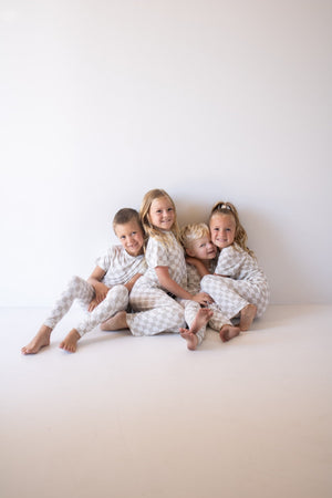 Child Boxy Tee Lounge Set in checkerboard pattern for kids, perfect for cozy pajama wear. Angle 4 view.