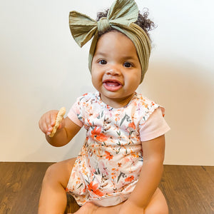 Peachy Dreams Bapron in angle 9 view, perfect for mess-free feeding and playtime for babies.