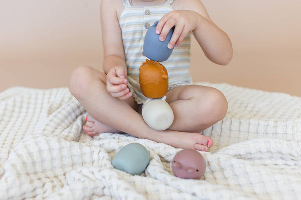 Colorful animal bath toy set for babies, featuring various cute designs, perfect for fun and safe bath time play.