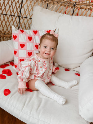 Laced with Love Sweatshirt Romper for babies in a stylish angle view, perfect for cozy and cute outfits.