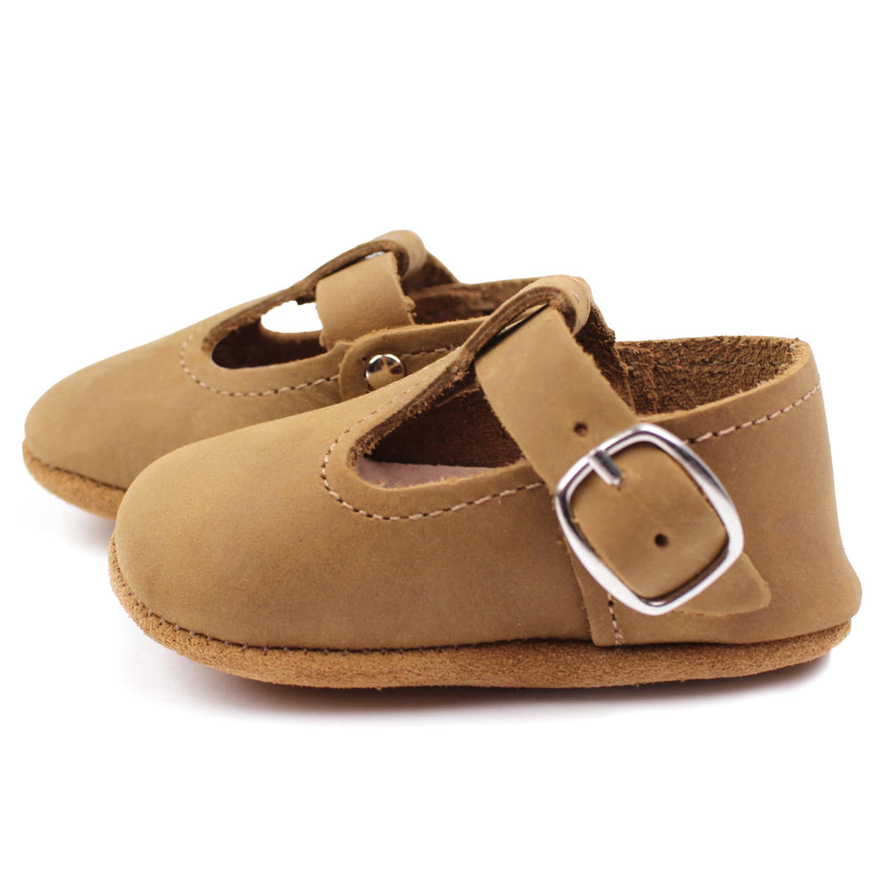Brown T-Strap Mary Jane soft sole baby shoes, perfect for comfort and style. Main product image.