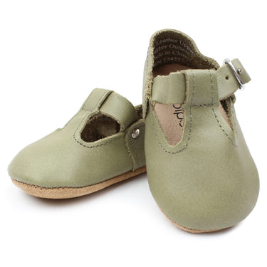 Olive T-Strap Mary Jane soft sole baby shoes in a stylish design, perfect for little ones' comfort and support.