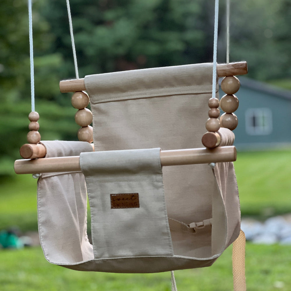 Premium outdoor high back swing in wheat color, perfect for comfortable outdoor relaxation.