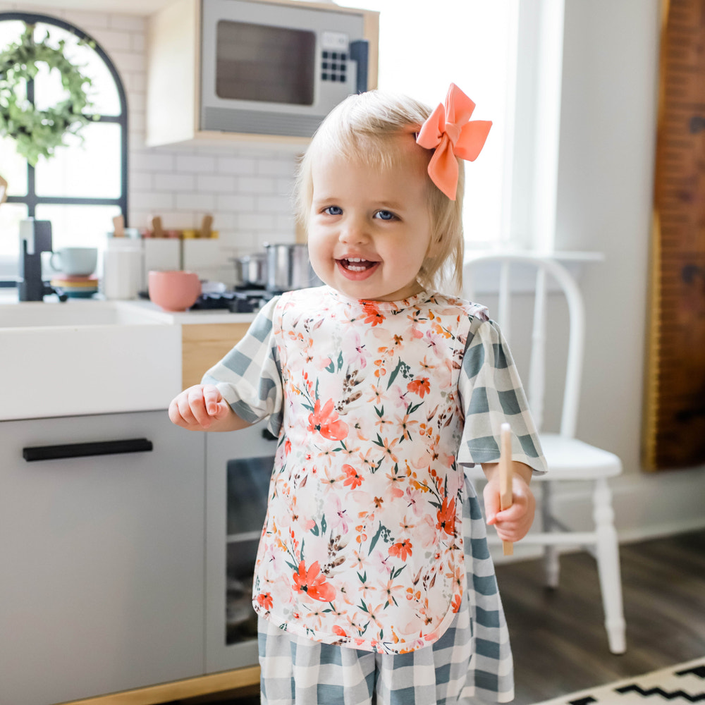 Peachy Dreams Bapron for babies, stylish and functional bib apron for mess-free mealtime adventures.
