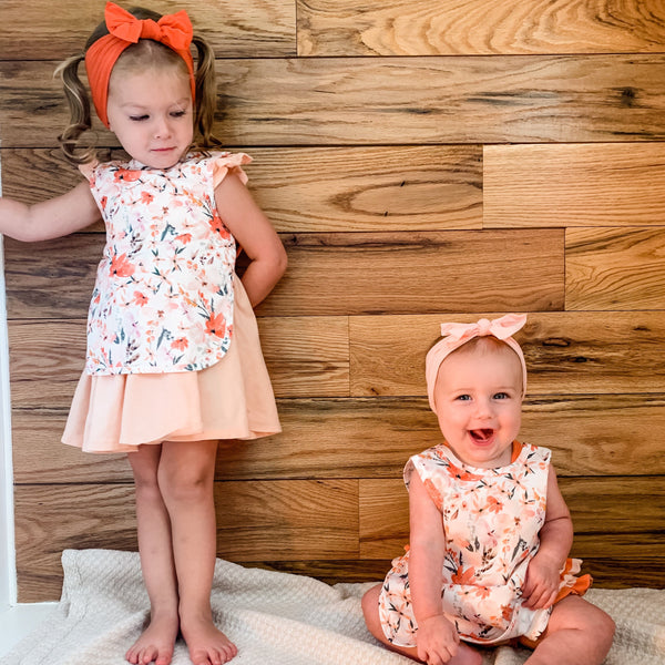 Peachy Dreams Bapron in Angle 13, featuring a stylish and functional design for babies during mealtime.