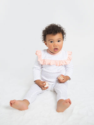 Organic cotton polka dot leggings for babies, soft and comfortable for everyday wear.