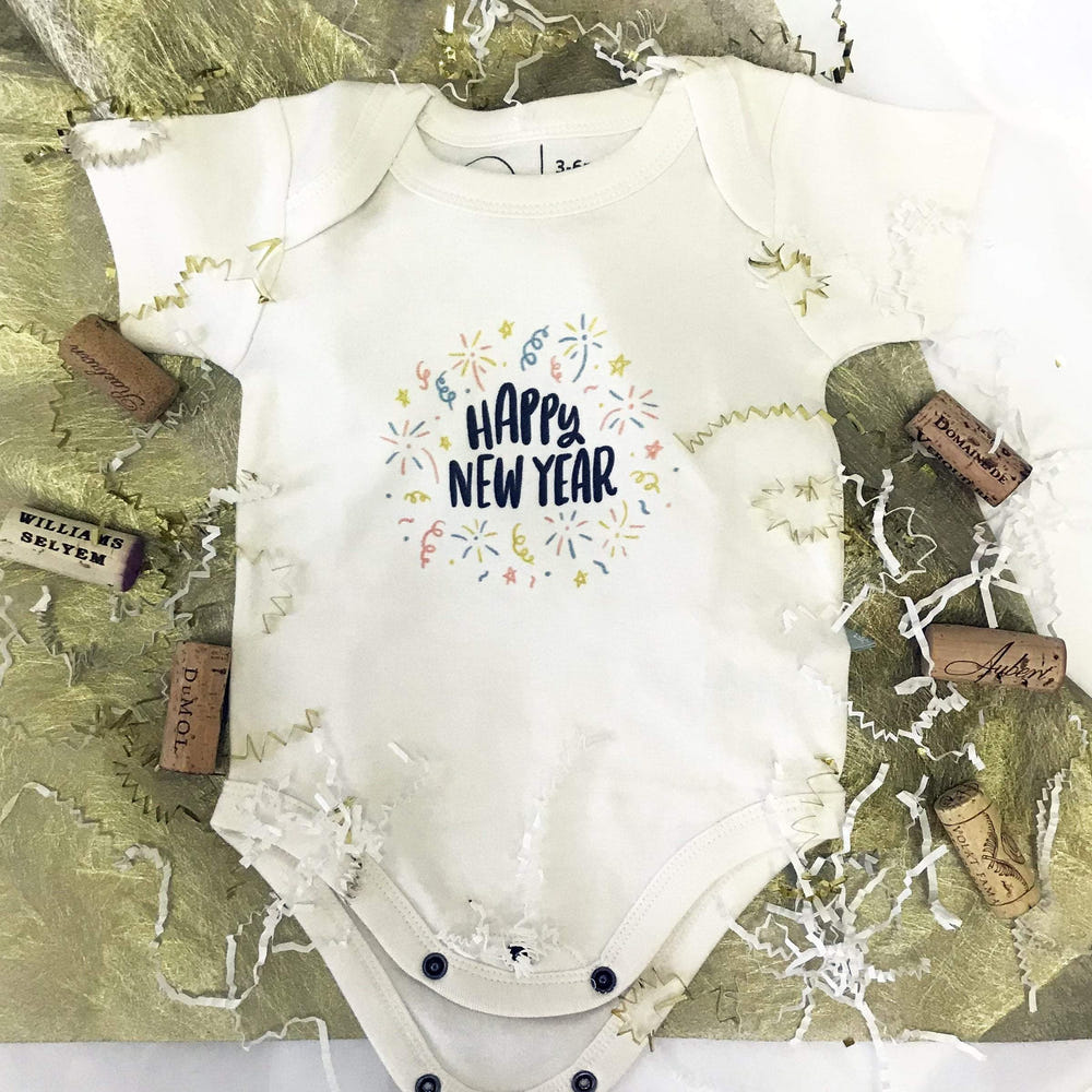 Happy New Year graphic bodysuit for babies - short sleeve design, perfect for festive celebrations.
