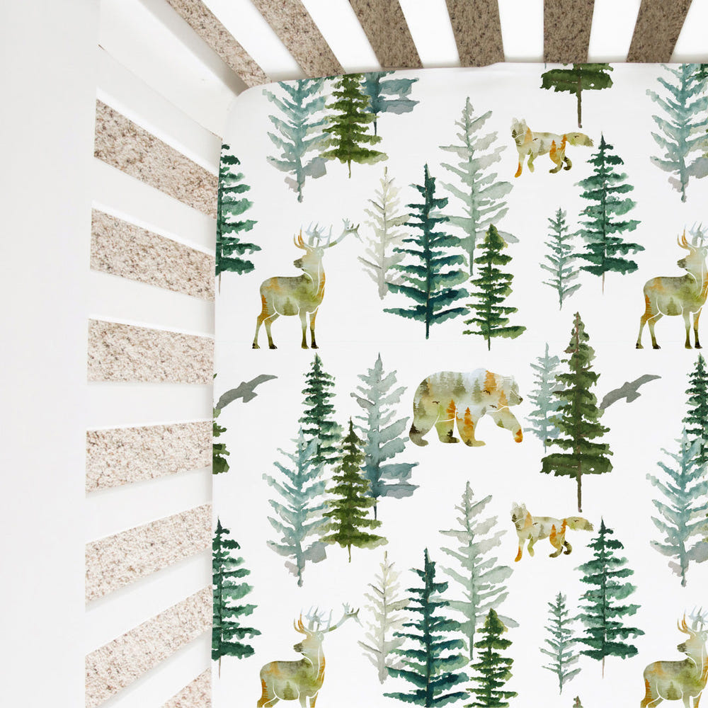 In The Woods Fitted Crib Sheet - Cozy, nature-inspired bedding for a stylish nursery.