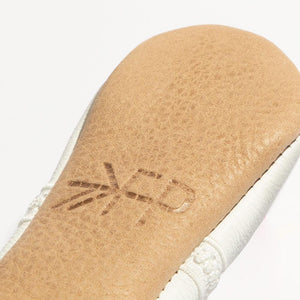 Ivory lace ballet slipper baby shoe, angle view, perfect for little dancers and special occasions.