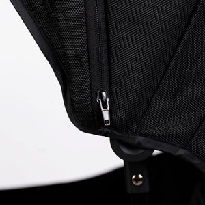 Oversized UV 50+ Retractable Canopy in Field Trip Black for baby strollers, angle view showcasing design and coverage.