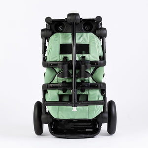 Stroller wagon "The Wagon - Spring Fern" at angle 6, showcasing its stylish design and spacious seating for babies.