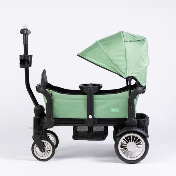Stroller wagon "The Wagon" in Spring Fern color, viewed from angle 2, showcasing its stylish design and functionality.